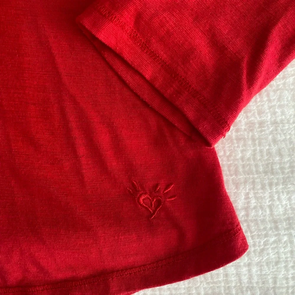Justice long sleeve shirt. red. size 10